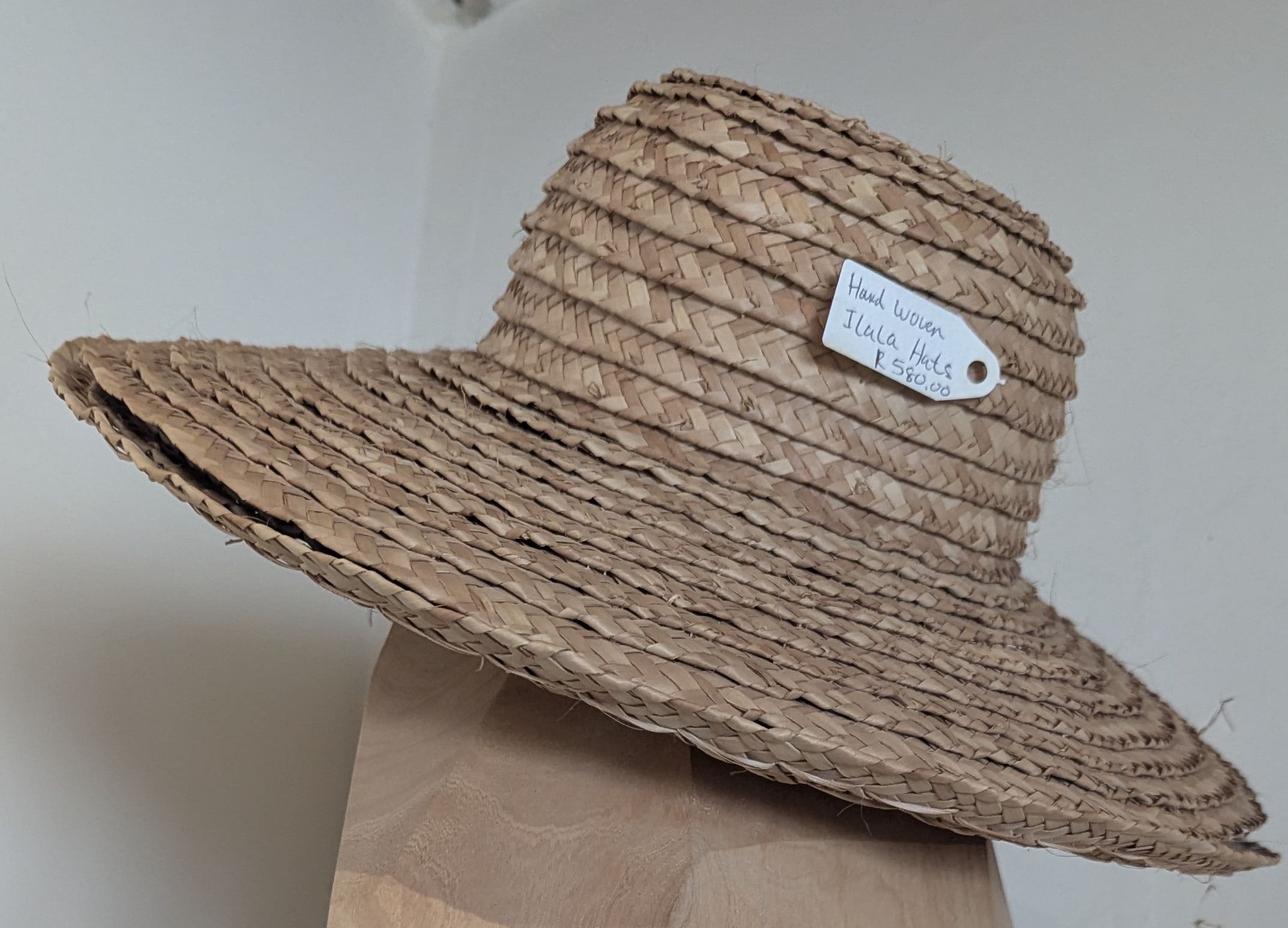 A wide-brimmed hand-woven Ilala palm sun hat
