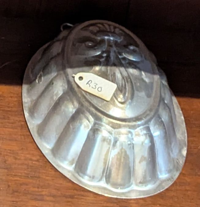 A fluted aluminium jelly mould