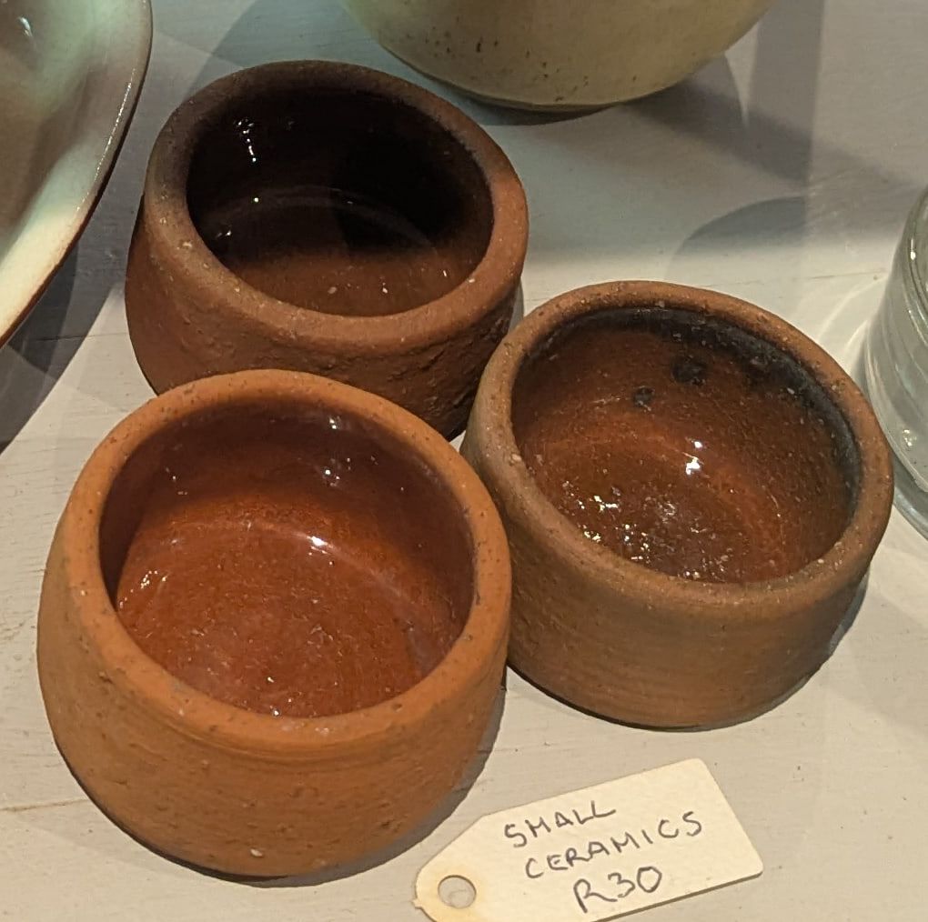 Small round glazed terracotta pots